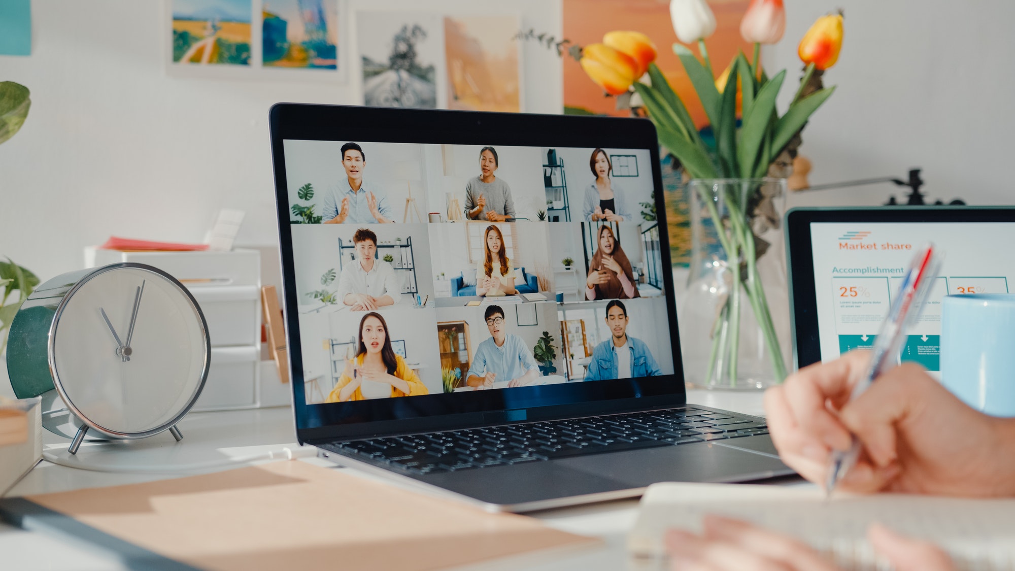 Young asia female employee listen leader on video call with colleagues at home.